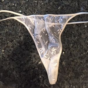 COPY - White see-thru embroidery decorated thong.